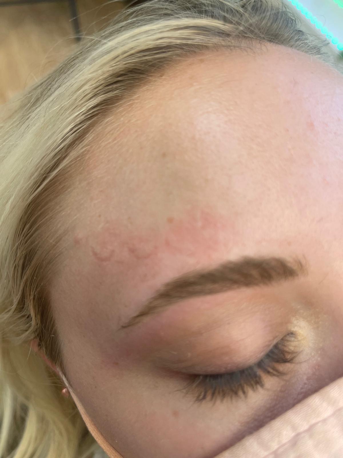 Soft blonde eyebrow shaped and tinted for added definition