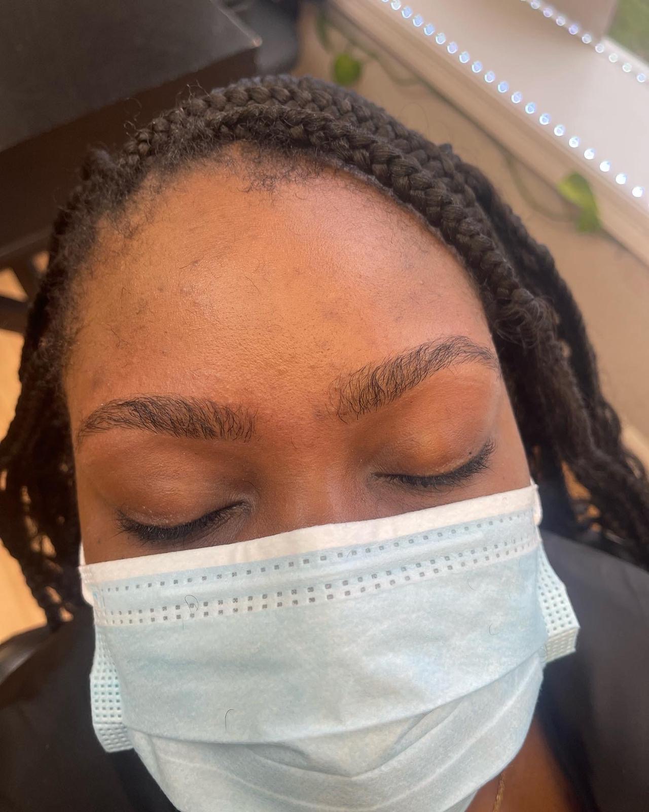 Both eyebrows shaped and balanced after threading